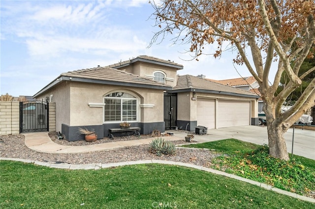 view of front of house with a front lawn and a garage