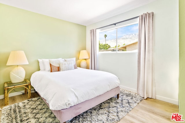 bedroom with light wood-type flooring