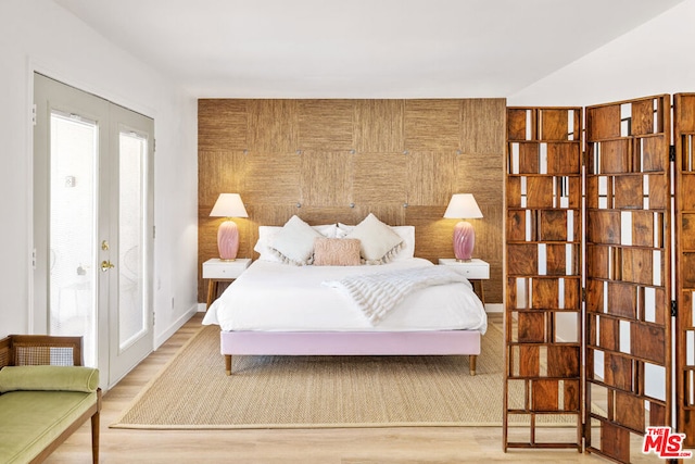 bedroom with light wood-type flooring