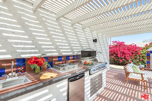 view of patio / terrace featuring a pergola, sink, grilling area, and area for grilling