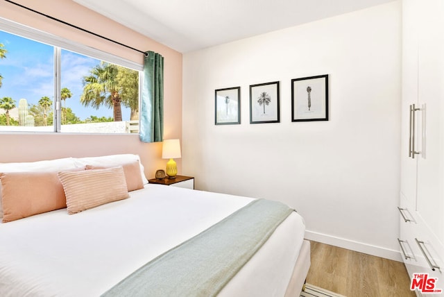 bedroom featuring light hardwood / wood-style floors