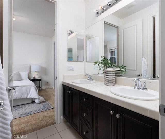 bathroom featuring vanity and tile patterned flooring