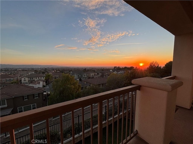 view of balcony at dusk