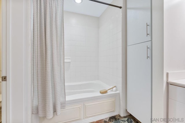 bathroom featuring shower / bath combo with shower curtain