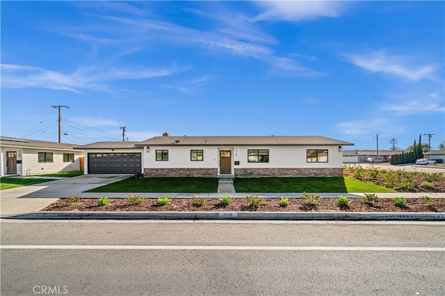 single story home with a front lawn and a garage