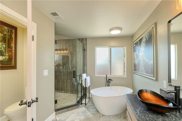 full bathroom with independent shower and bath, toilet, plenty of natural light, and vanity