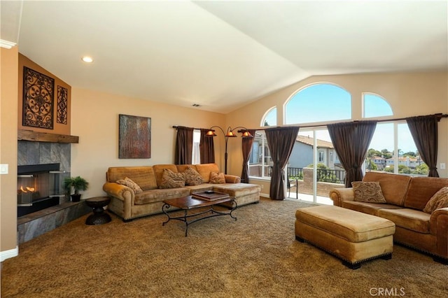 living room with carpet, lofted ceiling, and a tiled fireplace