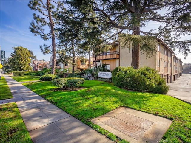 view of community with a lawn