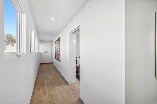 hallway featuring light hardwood / wood-style flooring