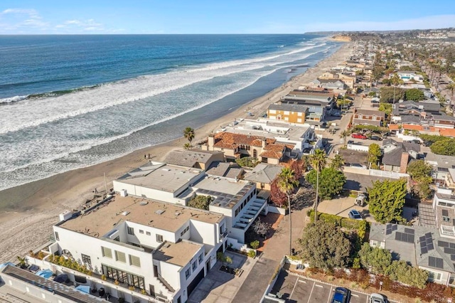 drone / aerial view with a view of the beach and a water view