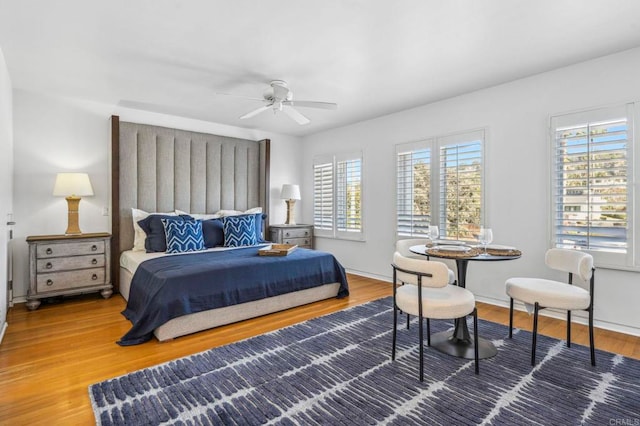 bedroom featuring ceiling fan and hardwood / wood-style floors