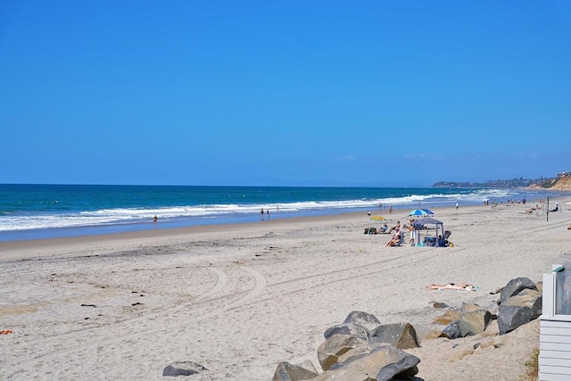 property view of water with a beach view