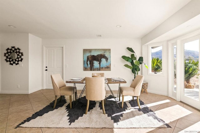 view of tiled dining space