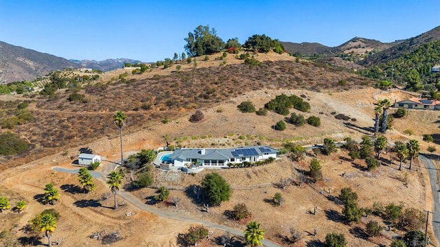 birds eye view of property with a rural view and a mountain view