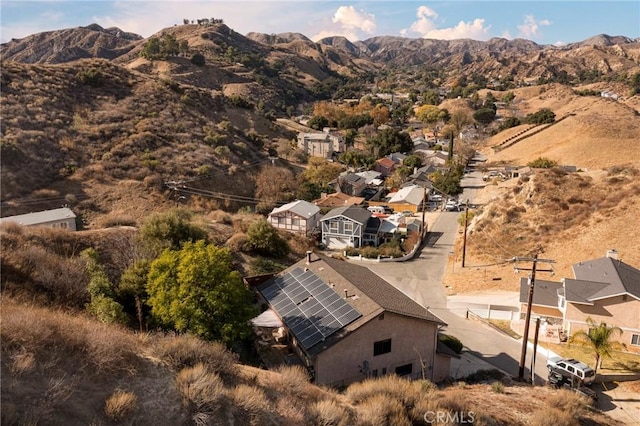 drone / aerial view featuring a mountain view