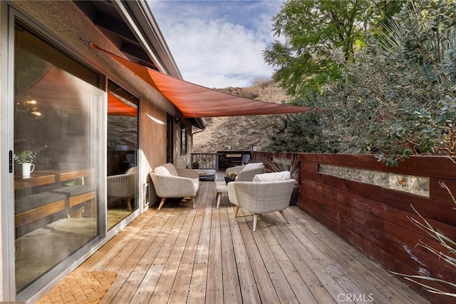 deck featuring an outdoor hangout area