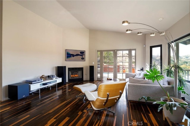 living room with dark hardwood / wood-style flooring