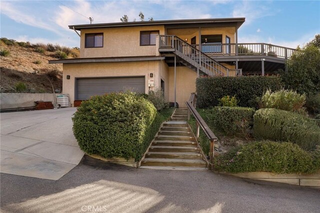 view of front of home with a garage