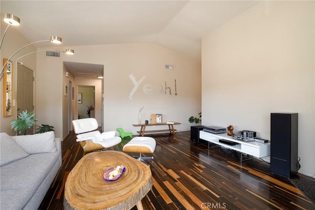 living room featuring lofted ceiling and dark wood-type flooring