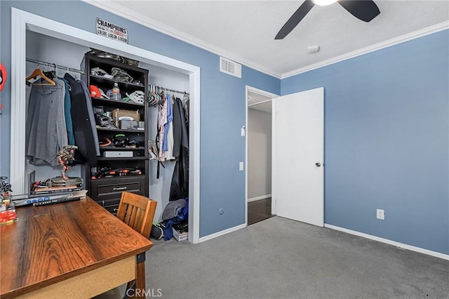 carpeted home office with ceiling fan and ornamental molding