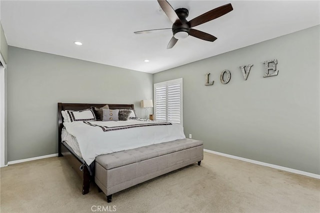 carpeted bedroom featuring ceiling fan