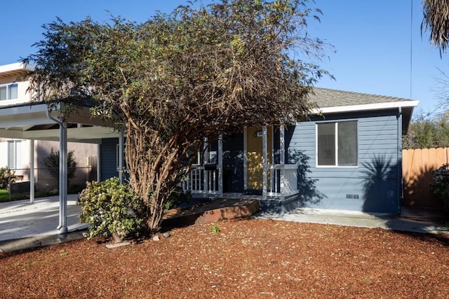 view of front of property with a carport