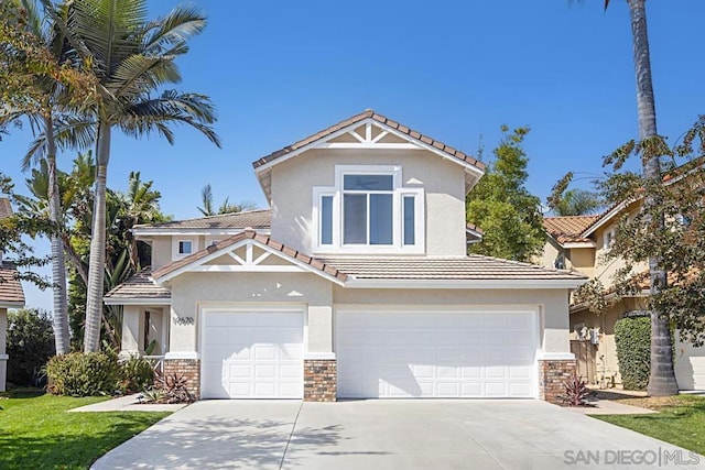 view of front of property with a garage