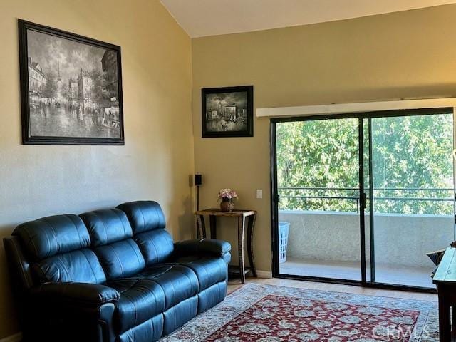 living room with vaulted ceiling