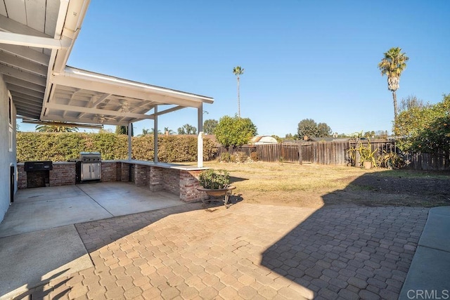 view of patio with a grill and area for grilling