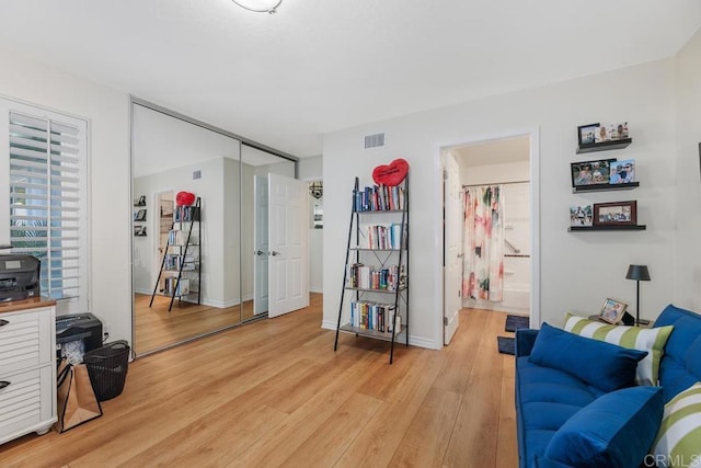 living area featuring light hardwood / wood-style flooring