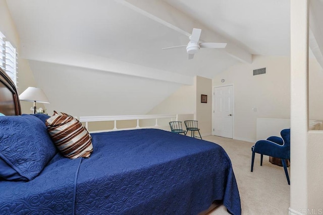 bedroom with ceiling fan, vaulted ceiling with beams, and light colored carpet