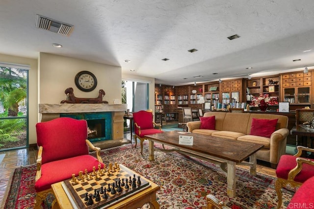 living room featuring a textured ceiling