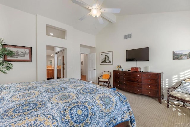 bedroom with light carpet, ceiling fan, ensuite bath, high vaulted ceiling, and beam ceiling