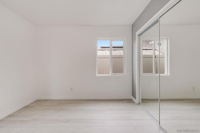 unfurnished bedroom with a closet