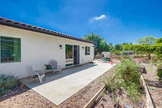 exterior space with a patio area