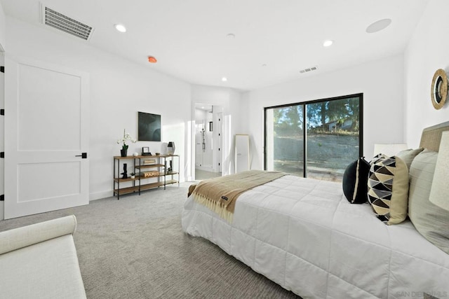 carpeted bedroom featuring access to outside