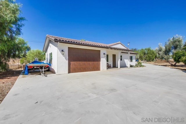 view of front of property with a garage