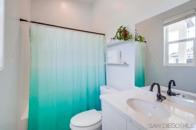 full bathroom with toilet, shower / bath combination with curtain, and vanity