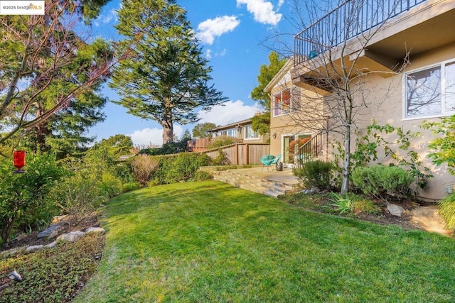 view of yard with a patio area