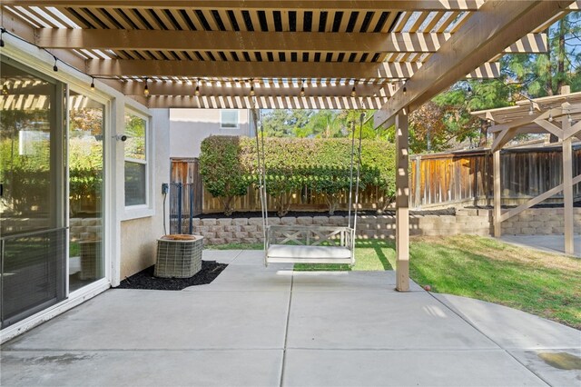 view of patio featuring central AC unit and a pergola