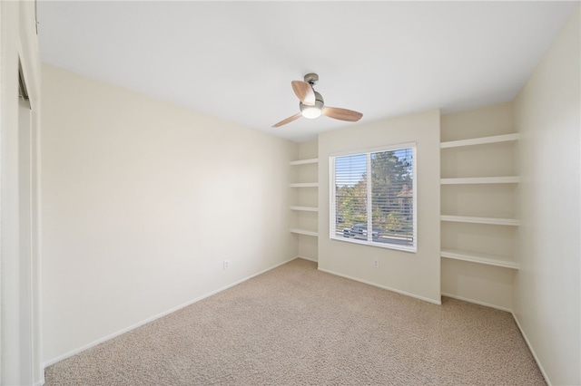 unfurnished bedroom with light carpet and ceiling fan