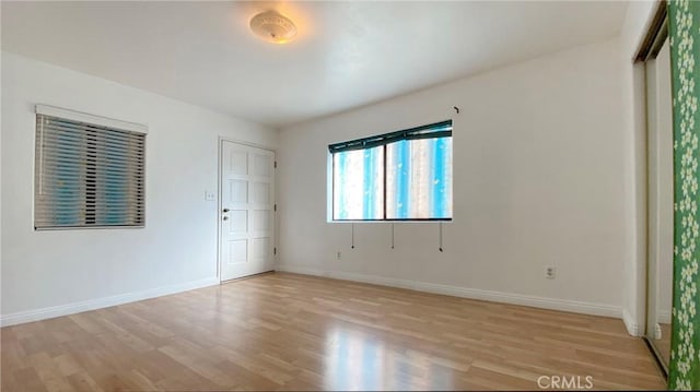 empty room featuring light wood-type flooring