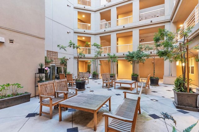 view of patio with a balcony