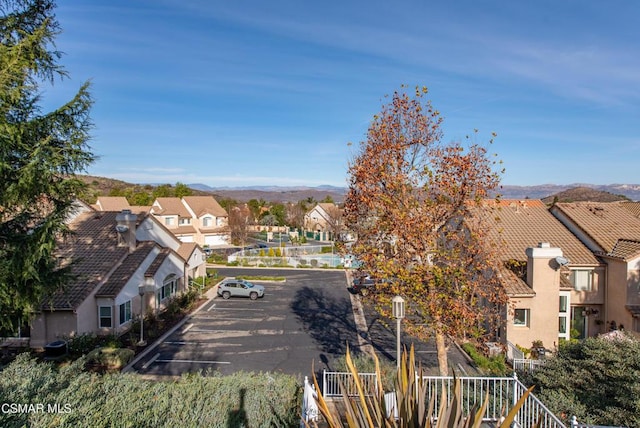 drone / aerial view featuring a mountain view