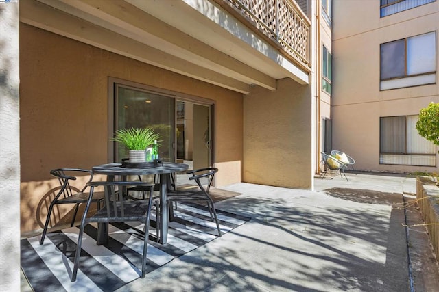 view of patio with a balcony