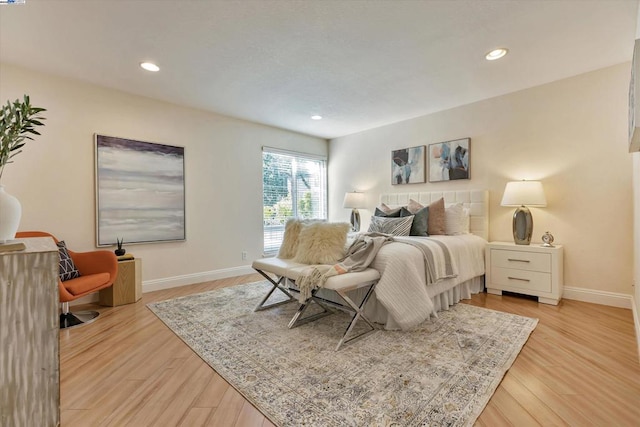 bedroom with light hardwood / wood-style flooring