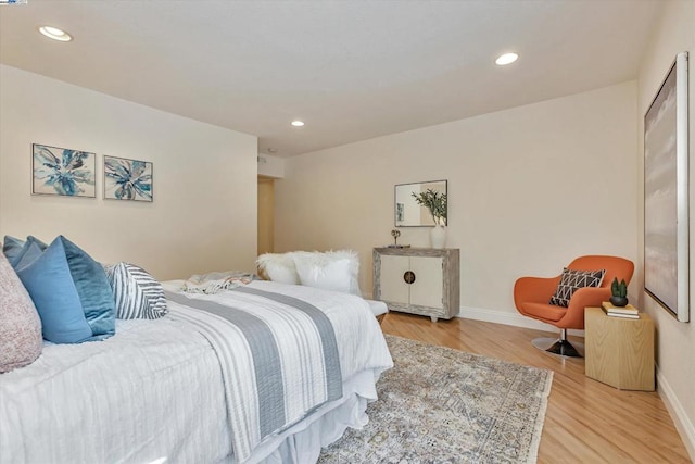 bedroom featuring light hardwood / wood-style floors