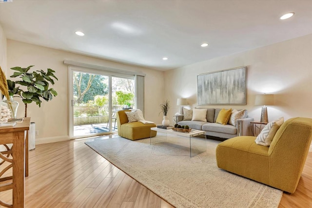 living room with light hardwood / wood-style floors