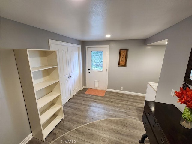 entrance foyer featuring hardwood / wood-style floors