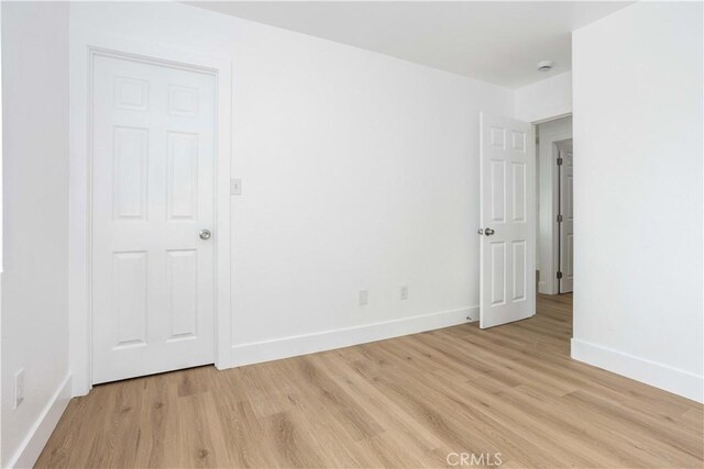 empty room featuring light wood-type flooring